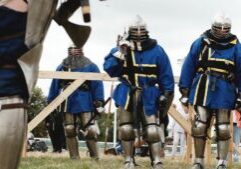 medieval knights standing on a battlefield